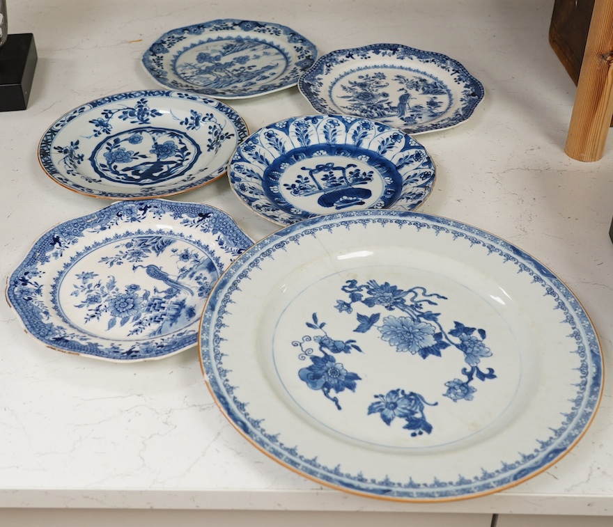 Six 18th century Chinese export blue and white plates, largest 32cm diameter. Condition - poor to fair